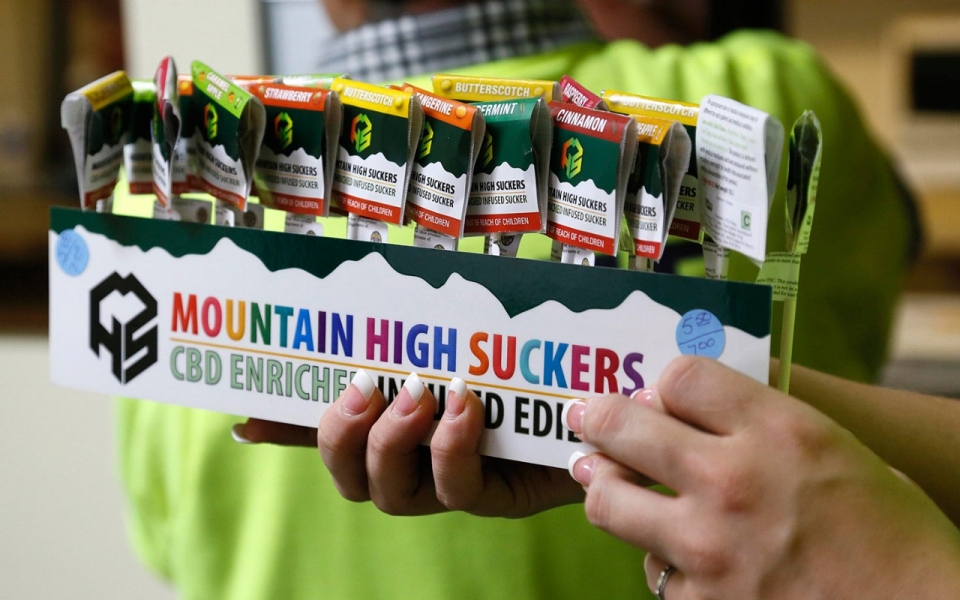 Edible marijuana products may be too attractive for kids given that plenty of these cannabis-enriched edibles use bright colors and big letters. Image Credit: Al Jazeera