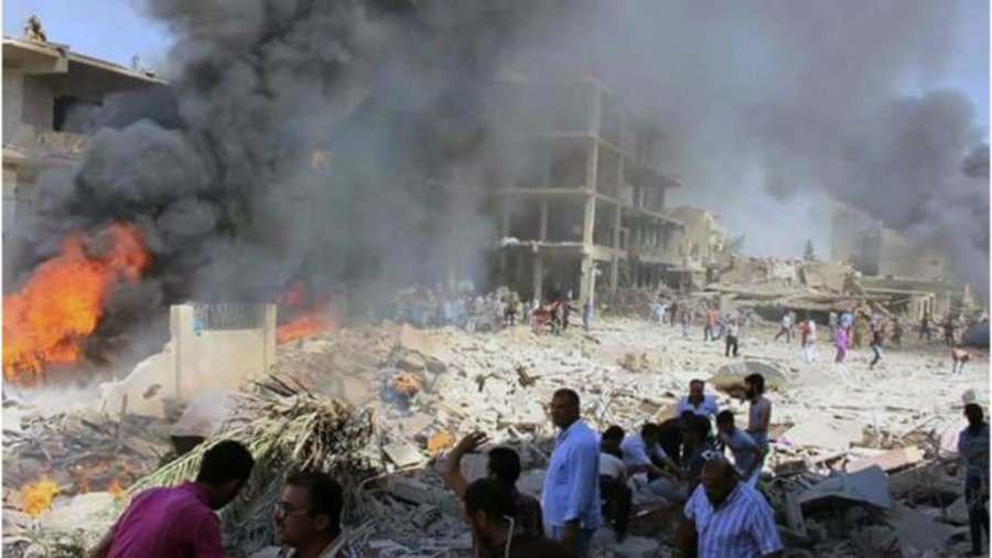 People in Syria watch where the attack took place in horror, after 44 casualties have been confirmed so far by authorities in the city of Qamishli. Image Credit: BBC