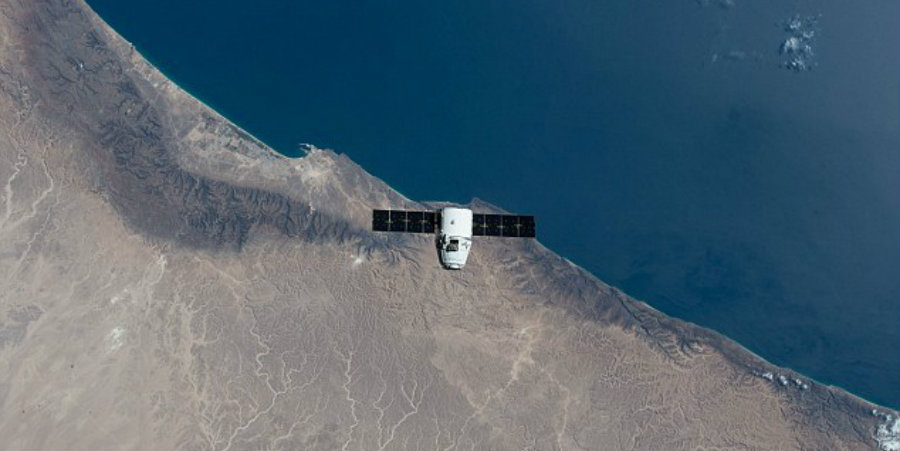 The moment SpaceX's Dragon capsule was released from the International Space Station and began its return to Earth. Image Credit: Daily Mail