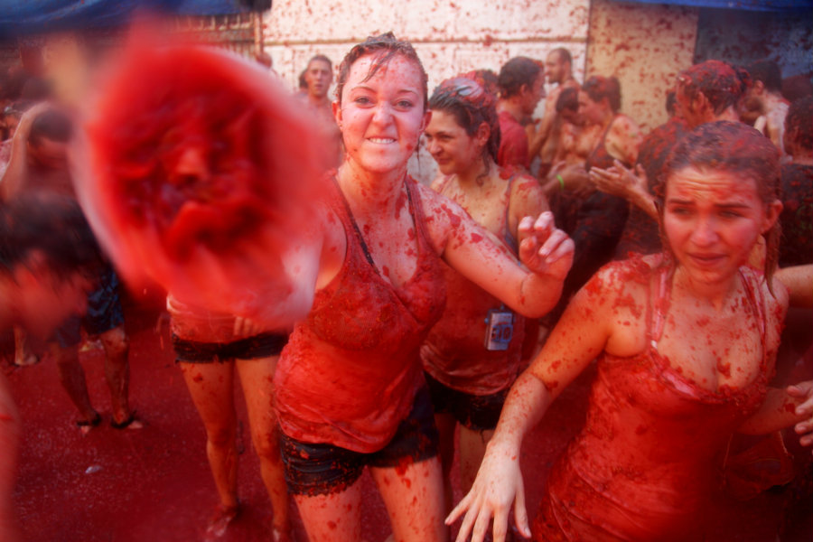 Over a hundred tons of fresh tomatoes arrived early Wednesday to provide enough ammo for the thousands of participants. Photo credit: LaTomatina.org