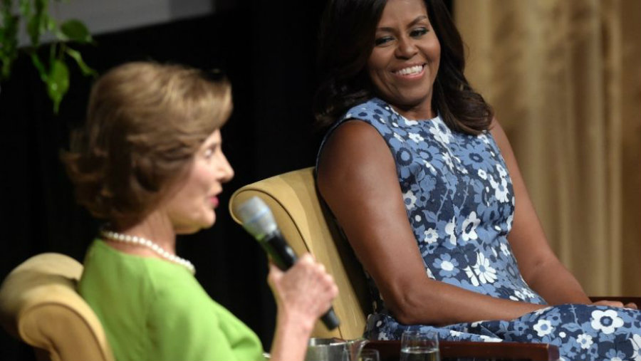 First ladies Obama and Bush sat down in a conference at the National Achieves with Bob Woodruff as moderator. Photo credit: AP / Fox News