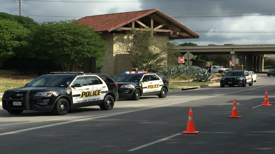 San Antonio Police Department crowded La Cantera Parkway after several people reported that someone was shooting at the passing cars. Photo credit: KSAT