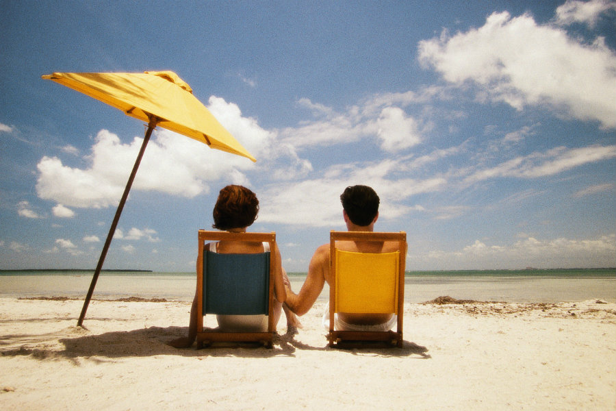 Use sunscreens instead of umbrellas at the beach A lot of people carry umbrellas to protect themselves from the sun. Photo credit: LocateADoc.com