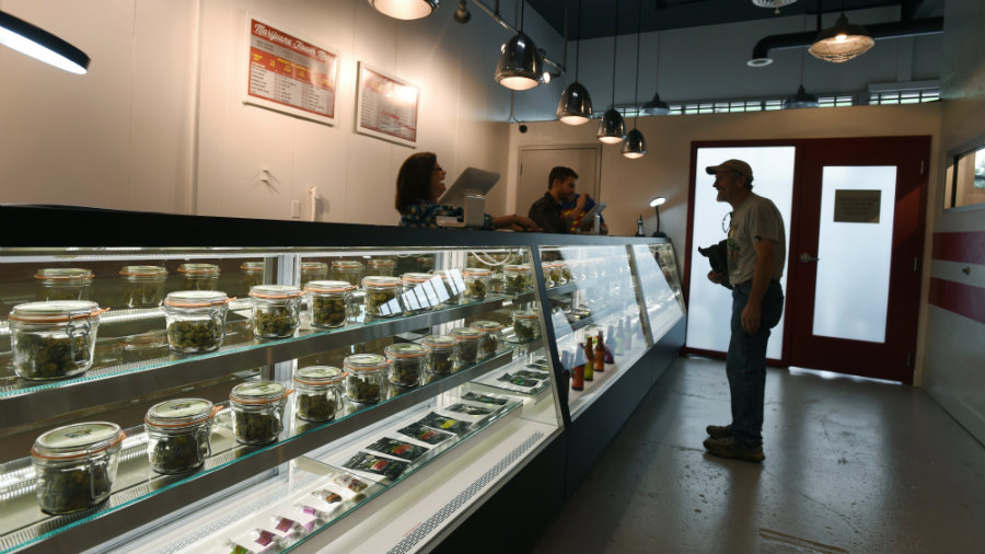 Manufacturing and distributing cannabis would be legal for anyone 21 years old or older. Image credit: AP Photo / The Gazette, Jerilee Bennett / The Washington Times