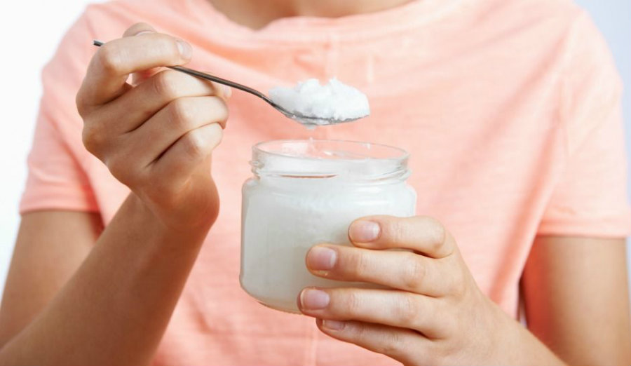 According to the AHA, coconut oil contains 82 percent of saturated fats. Image credit: Inquisitr