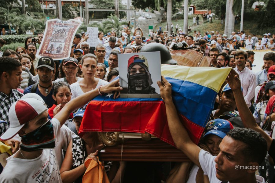 Neomar Lander's coffin, one of the boys killed in the protests. Image credit: María Cecilia Peña, Pulse Headlines