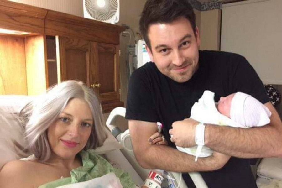 Megan and Nathan Johnson with their daughter Eilee Kate. Image credit: Erie News Now