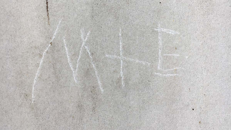 "M + E" carved into one of the memorial's pillars. credit: NBC Washington