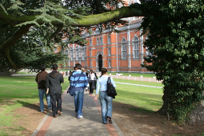 College Students Walking On Campus