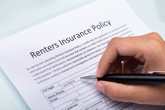 Person Filling Renters Insurance