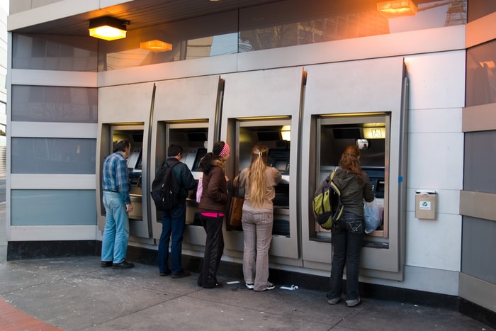 People Using ATM Machines