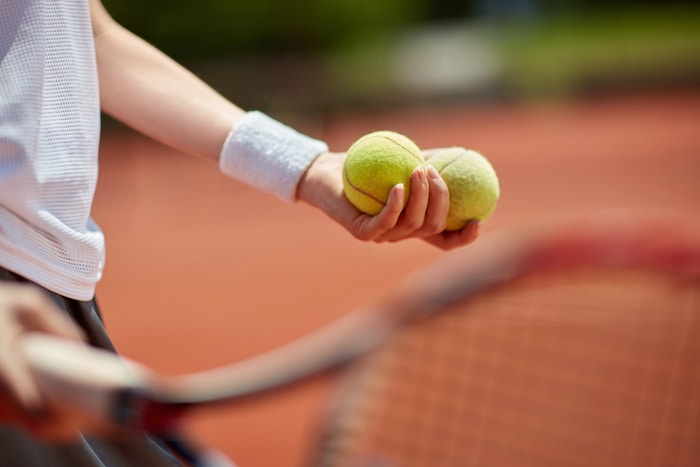 Tennis Balls on Tennis Court