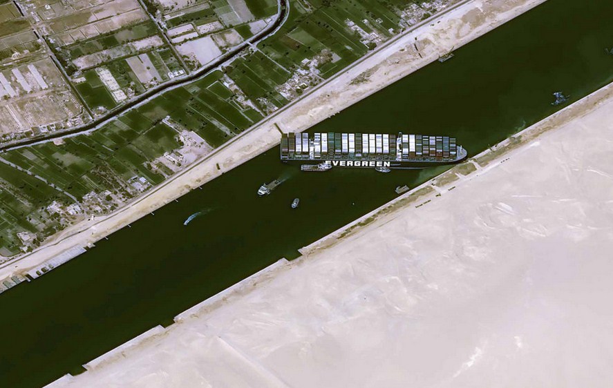 US Navy Offers To Help Re-Float Giant Container Ship Run Aground In Suez Canal